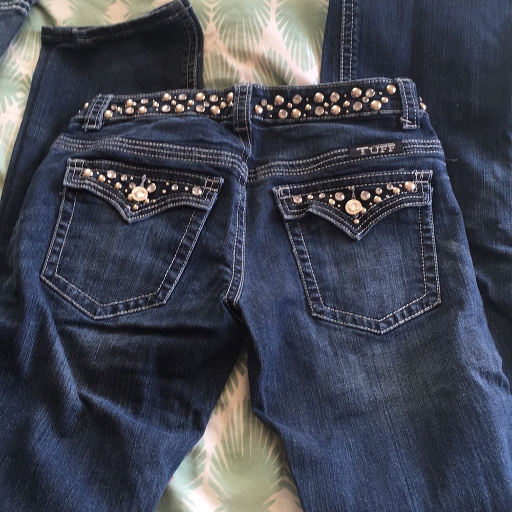 - Cowgirl Tuff jeans